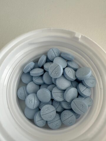 Oxycodone Hydrochloride Oxycodone, sold under various brand names such as Roxicodone and OxyContin (which is the extended release form), is a semi-synthetic opioid used medically for treatment of moderate to severe pain. It is highly addictive and It is usually taken by mouth, and is available in immediate-release and controlled-release formulations. Onset of pain relief typically begins within fifteen minutes and lasts for up to six hours with the immediate-release formulation. In the United Kingdom, it is available by injection. Combination products are also available with paracetamol (acetaminophen), ibuprofen, naloxone, naltrexone, and aspirin. Medical uses Oxycodone is used for managing moderate to severe acute or chronic pain when other treatments are not sufficient. It may improve quality of life in certain types of pain. Numerous studies have been completed, and the appropriate use of this compound does improve the quality of life of patients with long term chronic pain syndromes.