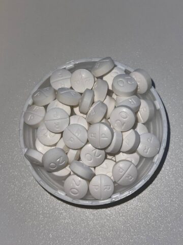 Oxycodone Hydrochloride Oxycodone, sold under various brand names such as Roxicodone and OxyContin (which is the extended release form), is a semi-synthetic opioid used medically for treatment of moderate to severe pain. It is highly addictive and It is usually taken by mouth, and is available in immediate-release and controlled-release formulations. Onset of pain relief typically begins within fifteen minutes and lasts for up to six hours with the immediate-release formulation. In the United Kingdom, it is available by injection. Combination products are also available with paracetamol (acetaminophen), ibuprofen, naloxone, naltrexone, and aspirin. Medical uses Oxycodone is used for managing moderate to severe acute or chronic pain when other treatments are not sufficient. It may improve quality of life in certain types of pain. Numerous studies have been completed, and the appropriate use of this compound does improve the quality of life of patients with long term chronic pain syndromes.