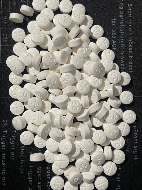 Oxycodone Hydrochloride Oxycodone, sold under various brand names such as Roxicodone and OxyContin (which is the extended release form), is a semi-synthetic opioid used medically for treatment of moderate to severe pain. It is highly addictive and It is usually taken by mouth, and is available in immediate-release and controlled-release formulations. Onset of pain relief typically begins within fifteen minutes and lasts for up to six hours with the immediate-release formulation. In the United Kingdom, it is available by injection. Combination products are also available with paracetamol (acetaminophen), ibuprofen, naloxone, naltrexone, and aspirin. Medical uses Oxycodone is used for managing moderate to severe acute or chronic pain when other treatments are not sufficient. It may improve quality of life in certain types of pain. Numerous studies have been completed, and the appropriate use of this compound does improve the quality of life of patients with long term chronic pain syndromes.